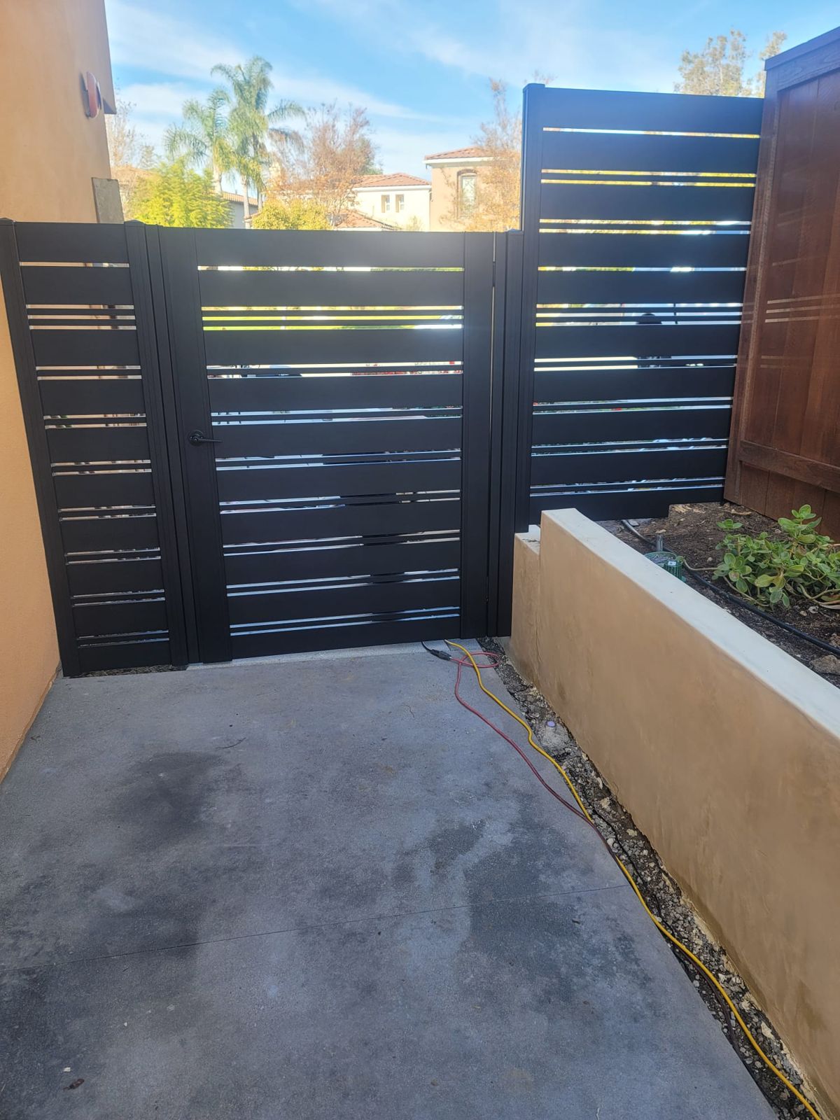 Matching walk gate in a horizontal fence